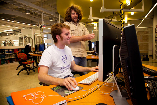 two guys working at a computer